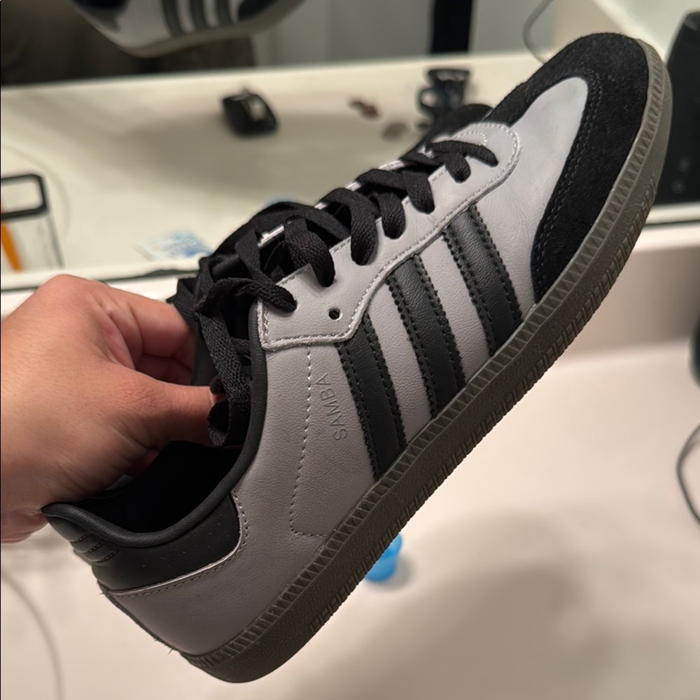 adidas Black Sneakers with Smooth Upper and Signature Stripes
